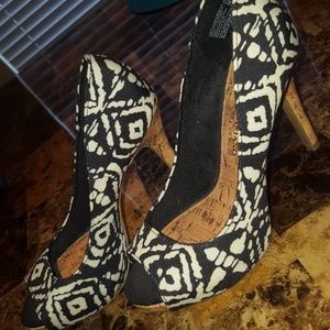 Black and white with faux wooden heels